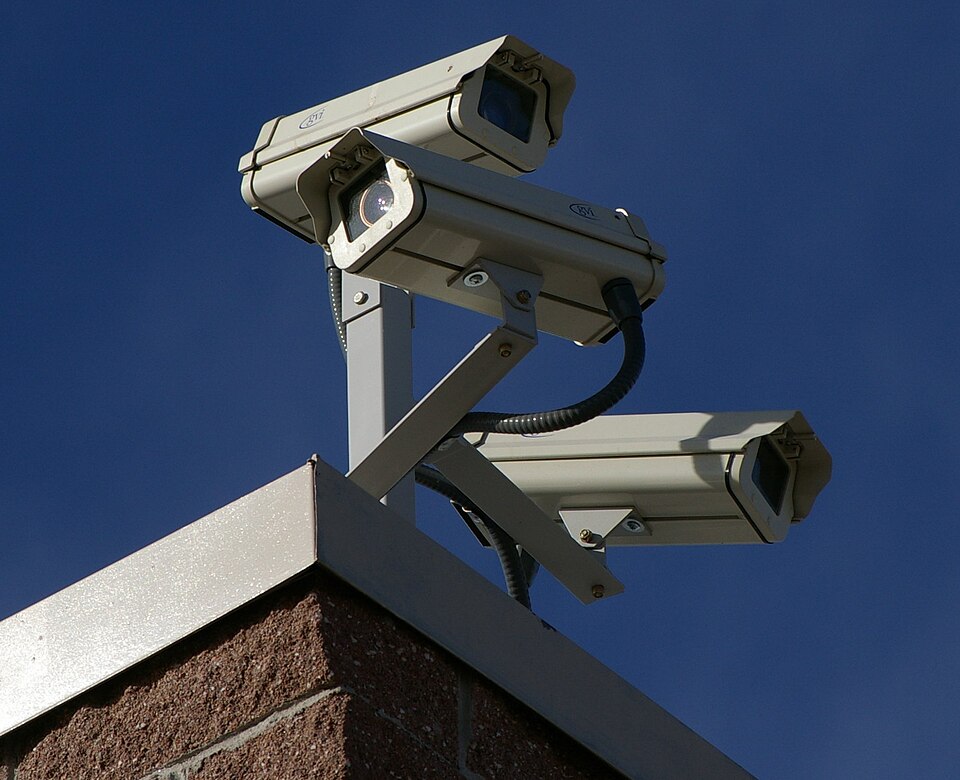three surveillance cameras